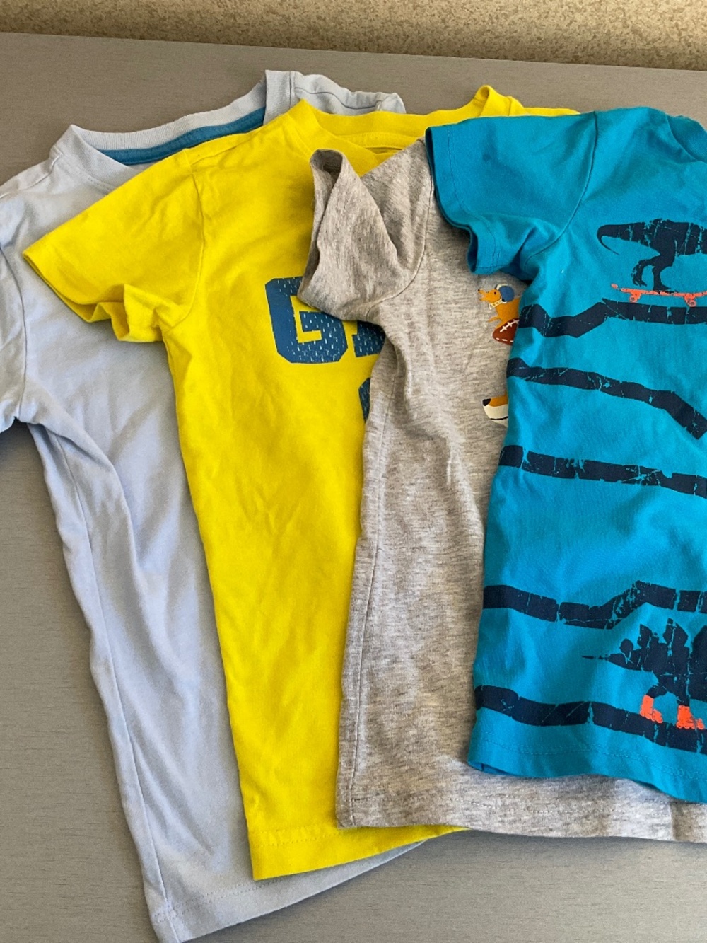 Bundle of 4 boys T- shirts, size 5